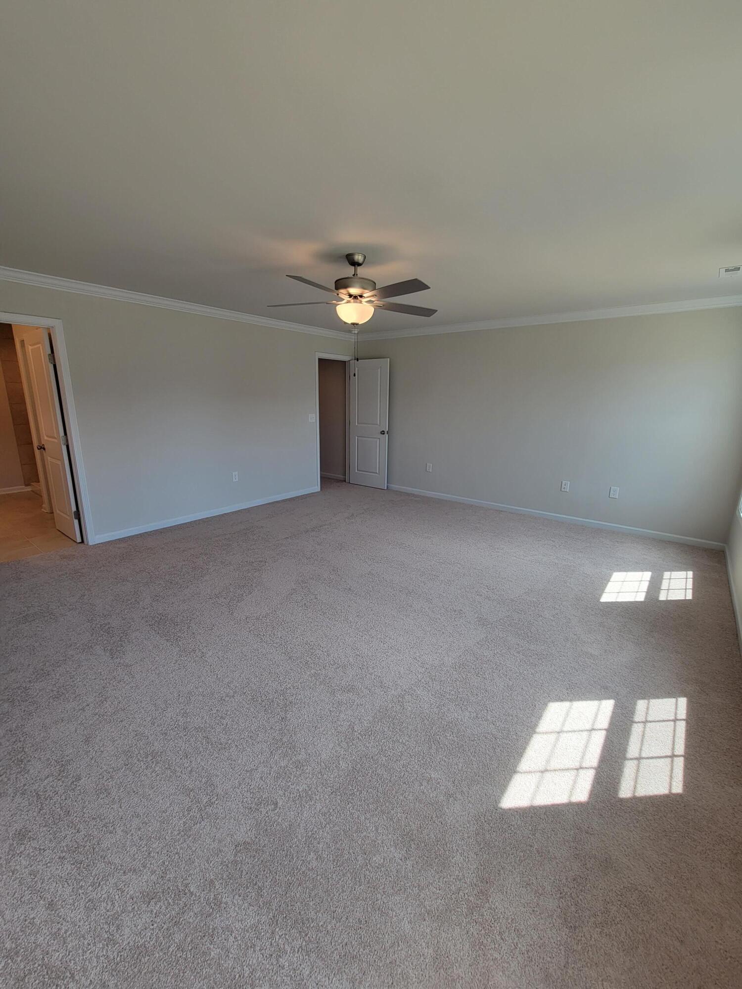 4933 Warrior Drive Salem, VA 24153 - Photo 7 of 11 an empty room with a empty space and window