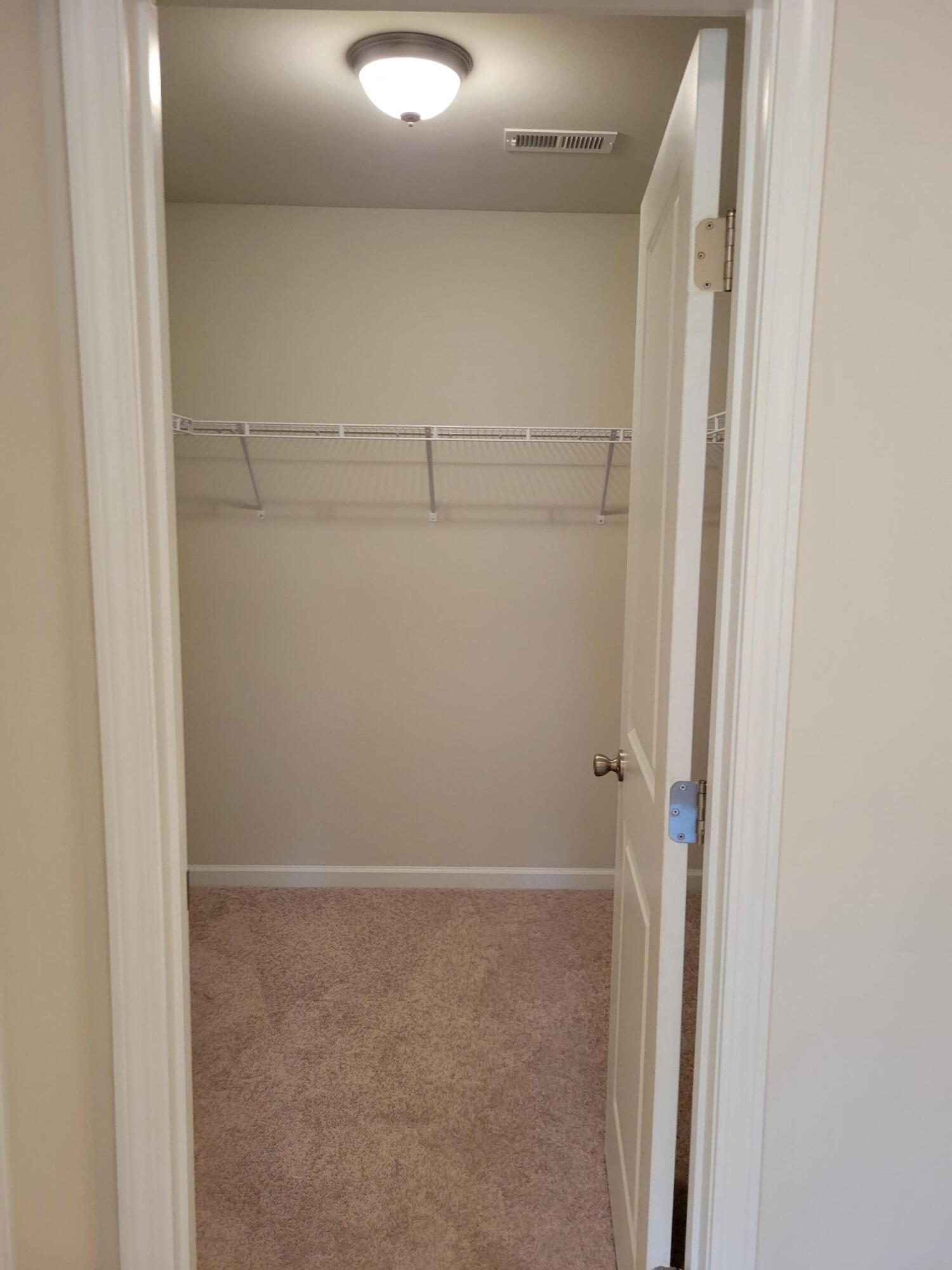 4933 Warrior Drive Salem, VA 24153 - Photo 8 of 11 a view of a room with racks on the wall