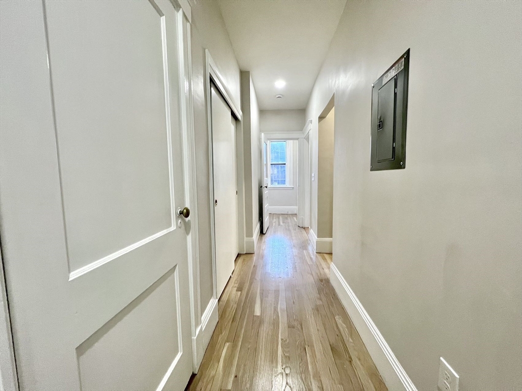 6 Parkway Brookline Ma, Unit 2 Brookline, MA 02445 - Photo 10 of 10 a view of a hallway with wooden floor