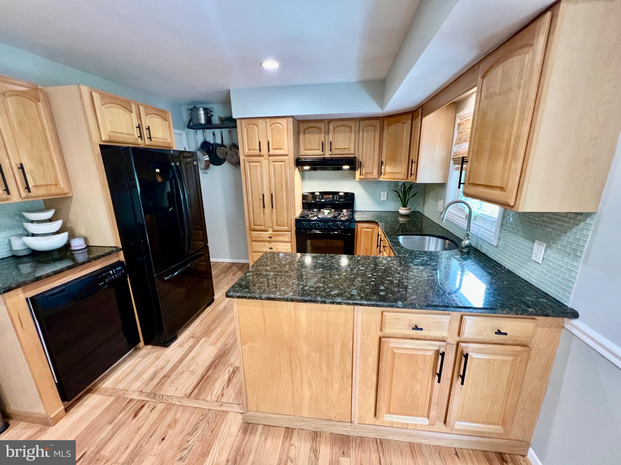 4 Running Brook Road Ewing, NJ 08638 - Photo 16 of 46 Modern kitchen with warm wood tones.
