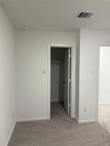 an empty room with closet
