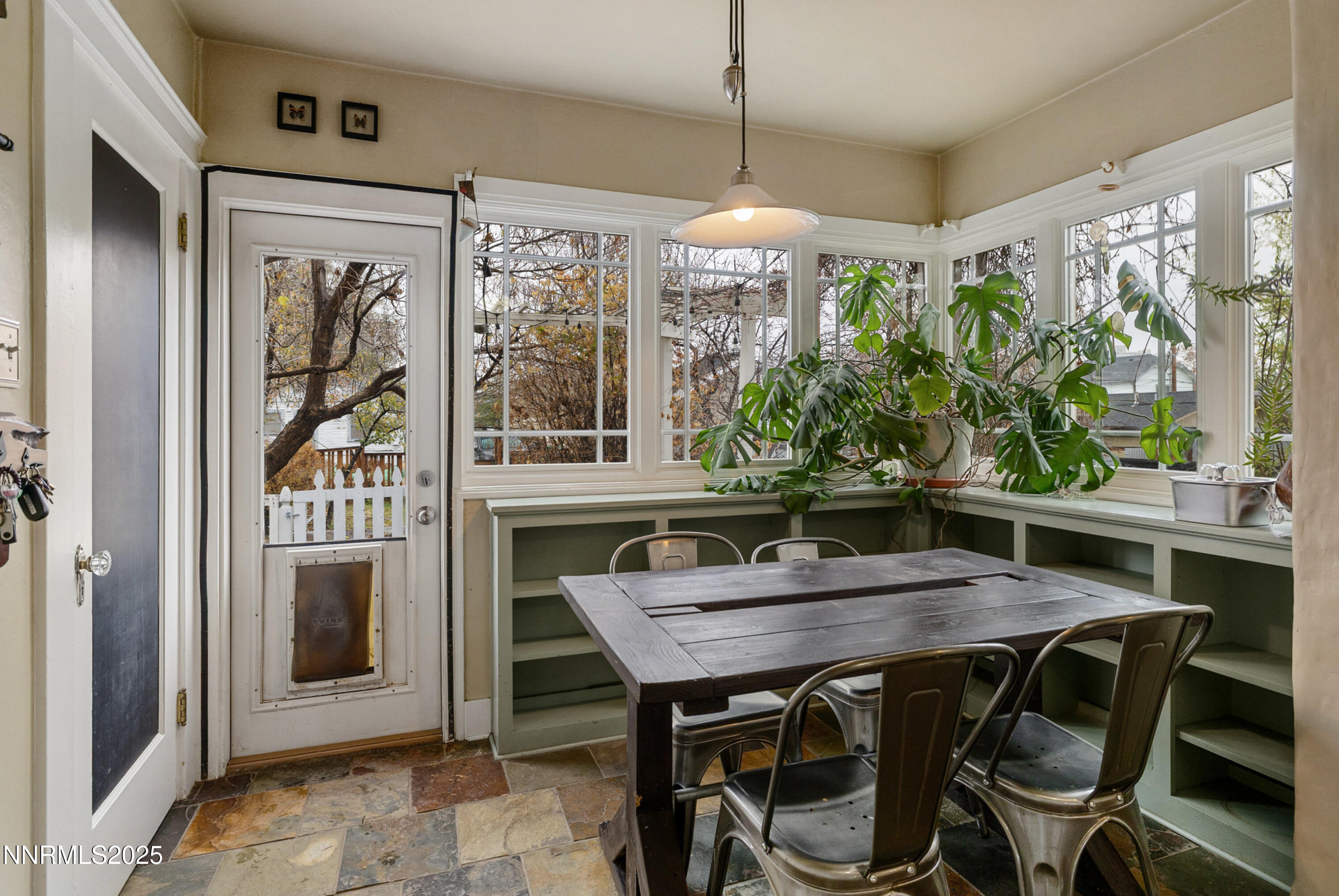 948 Washington Street Reno, NV 89503 - Photo 12 of 29 a view of a dining room with furniture window and wooden floor
