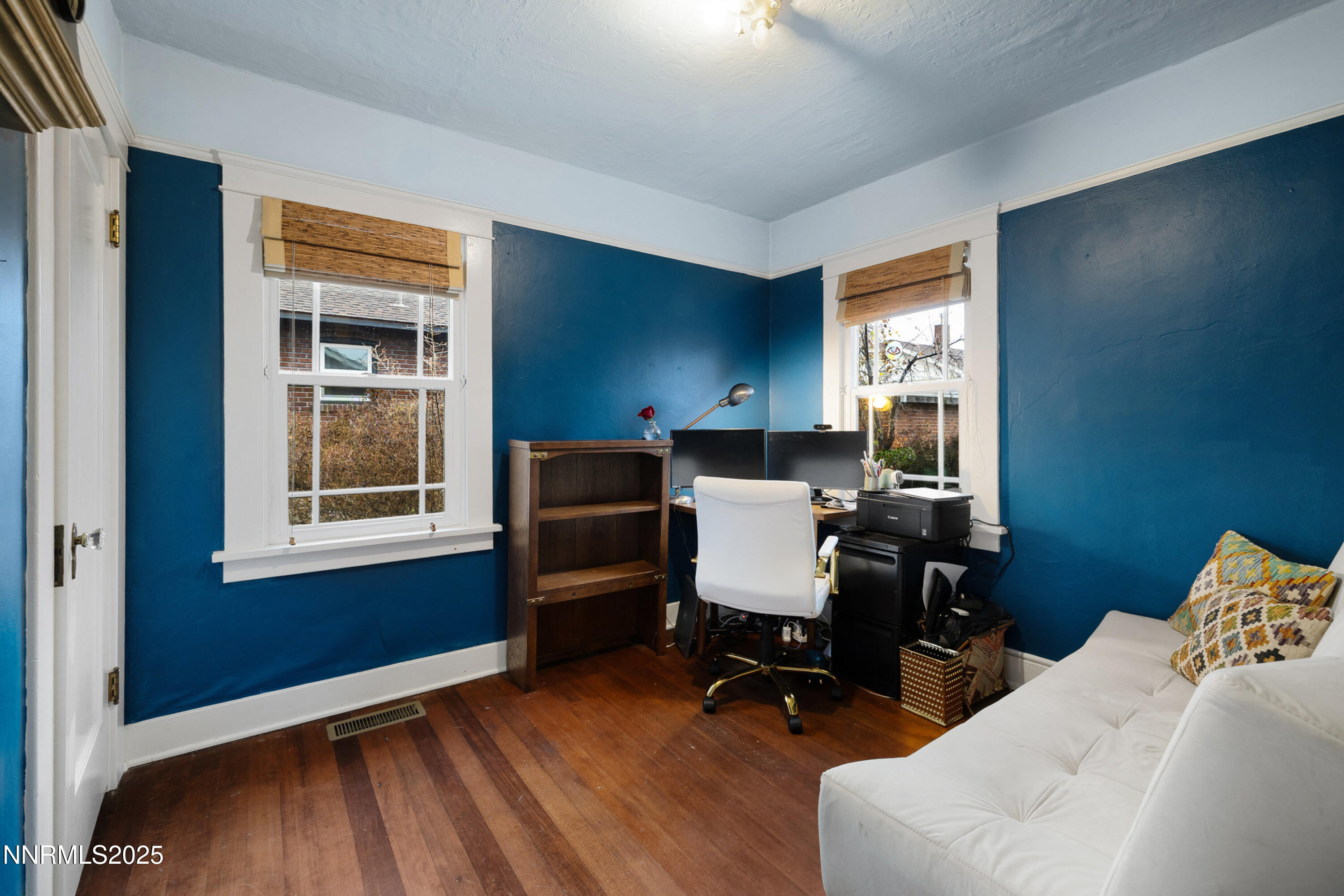 948 Washington Street Reno, NV 89503 - Photo 17 of 29 a view of a workspace with furniture and a window