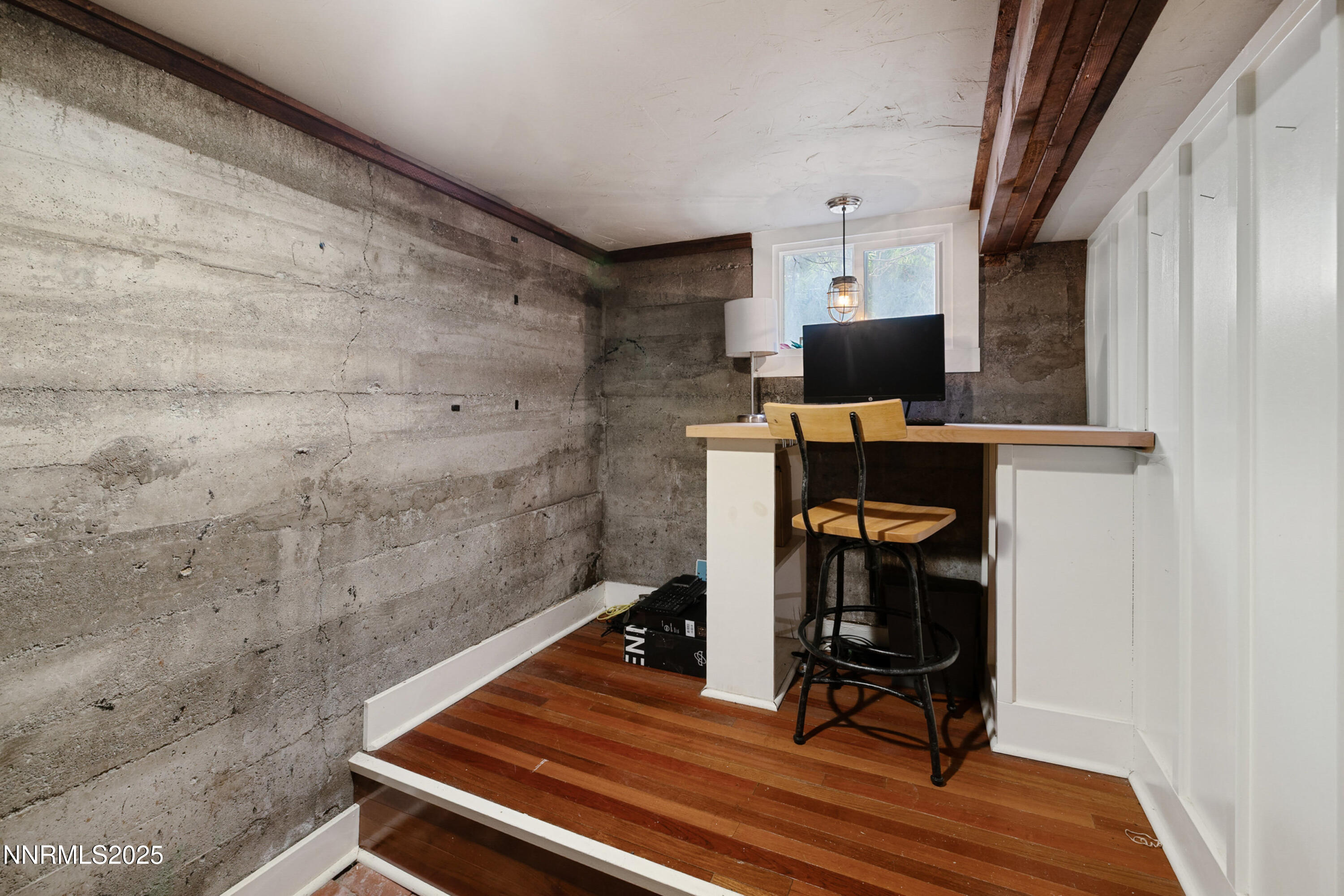 948 Washington Street Reno, NV 89503 - Photo 22 of 29 a room with wooden floor and furniture