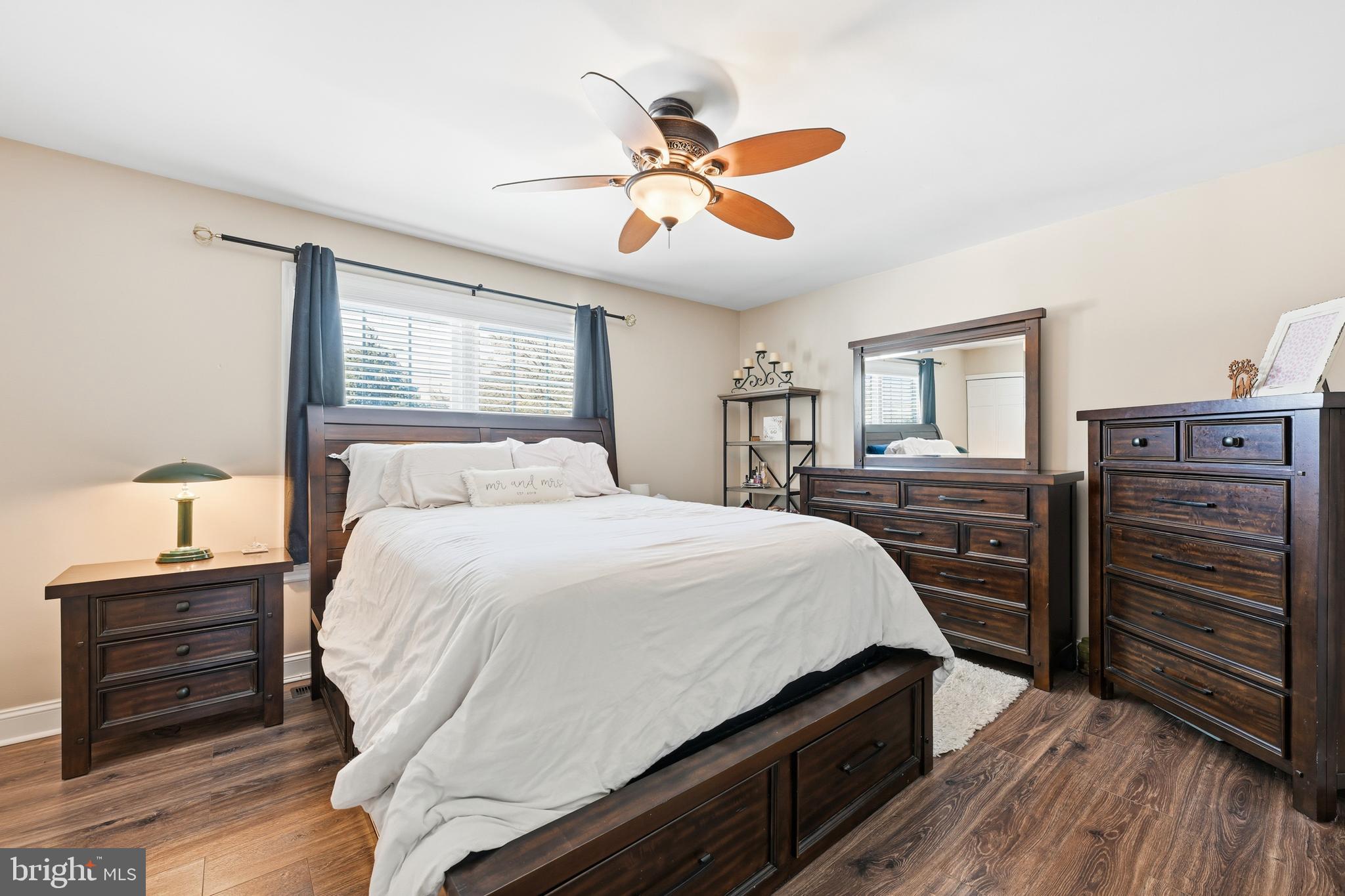 55 Violet Lane Newtown, PA 18940 - Photo 12 of 24 a bedroom with a bed and wooden floor