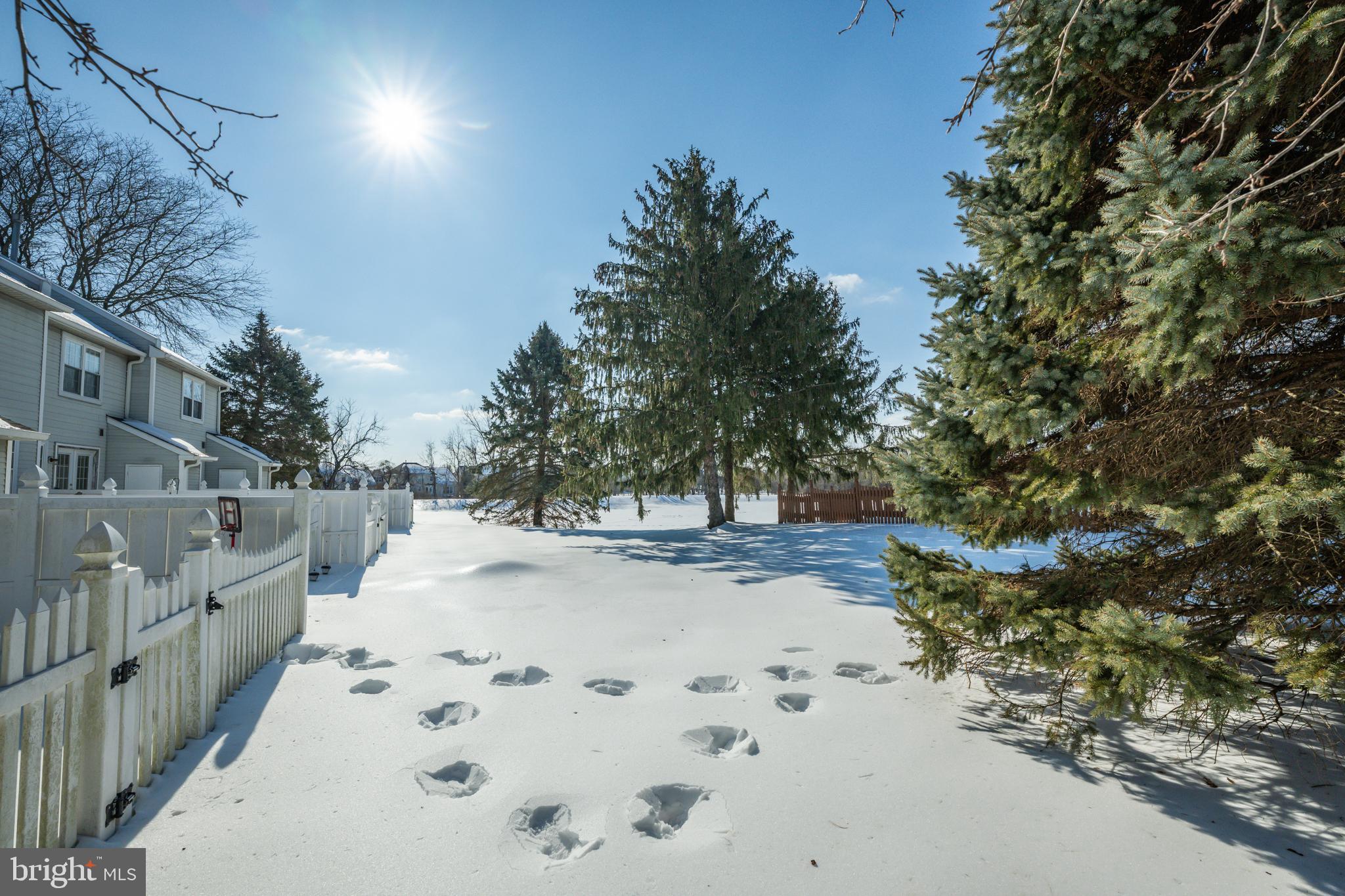 55 Violet Lane Newtown, PA 18940 - Photo 23 of 24 a view of white house with snow on the road