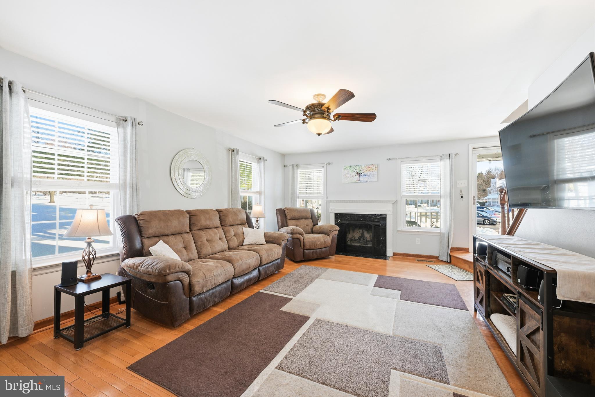 55 Violet Lane Newtown, PA 18940 - Photo 10 of 24 a living room with furniture fireplace and window