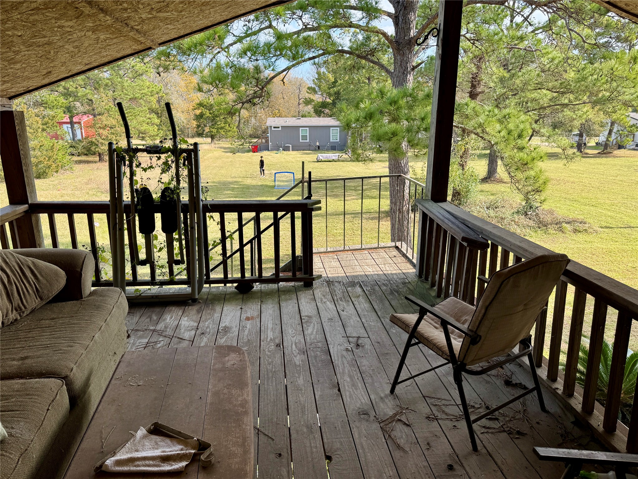 307 Deerwood Drive Trinity, TX 75862 - Photo 17 of 27 This would be my coffee and reading spot! I love a great porch!