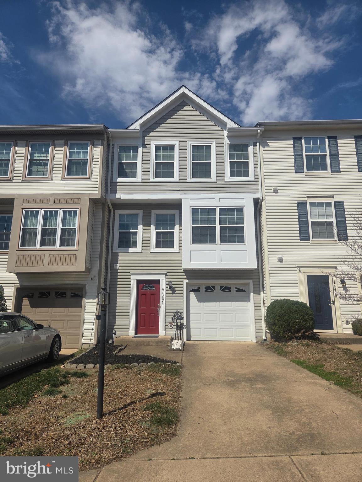 17381 Sligo Loop Dumfries, VA 22026 - Photo 1 of 35 a front view of a house with a yard