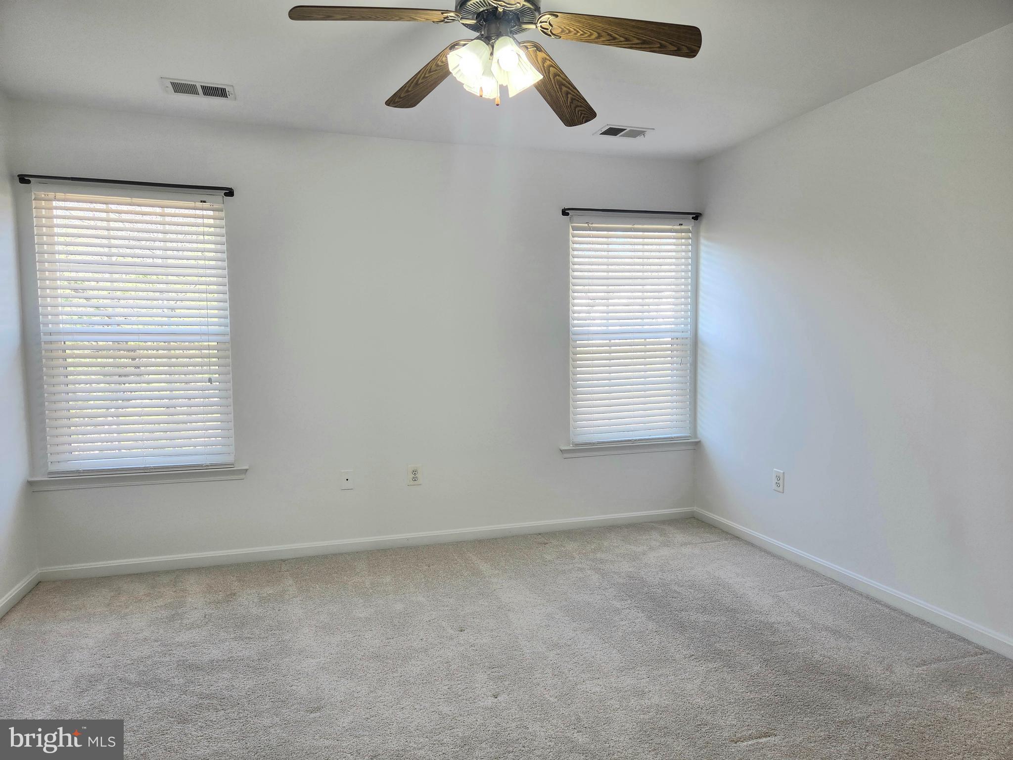 17381 Sligo Loop Dumfries, VA 22026 - Photo 13 of 35 a view of an empty room with a window