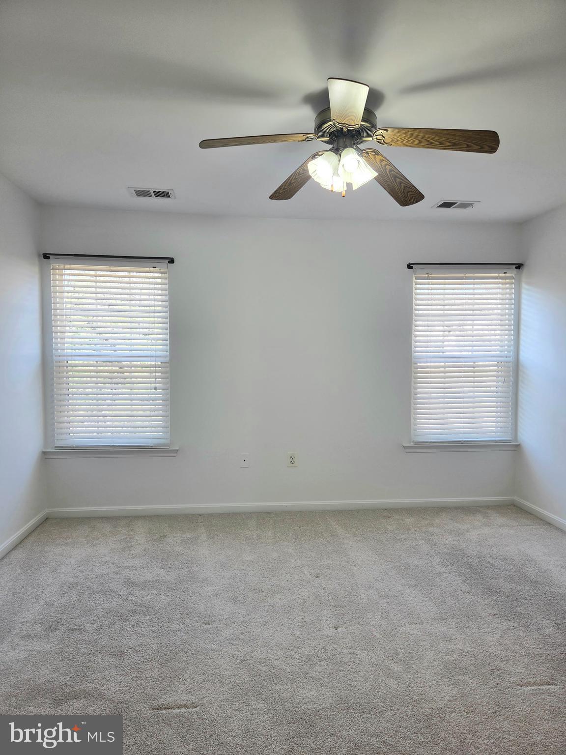 17381 Sligo Loop Dumfries, VA 22026 - Photo 14 of 35 a view of an empty room with a window