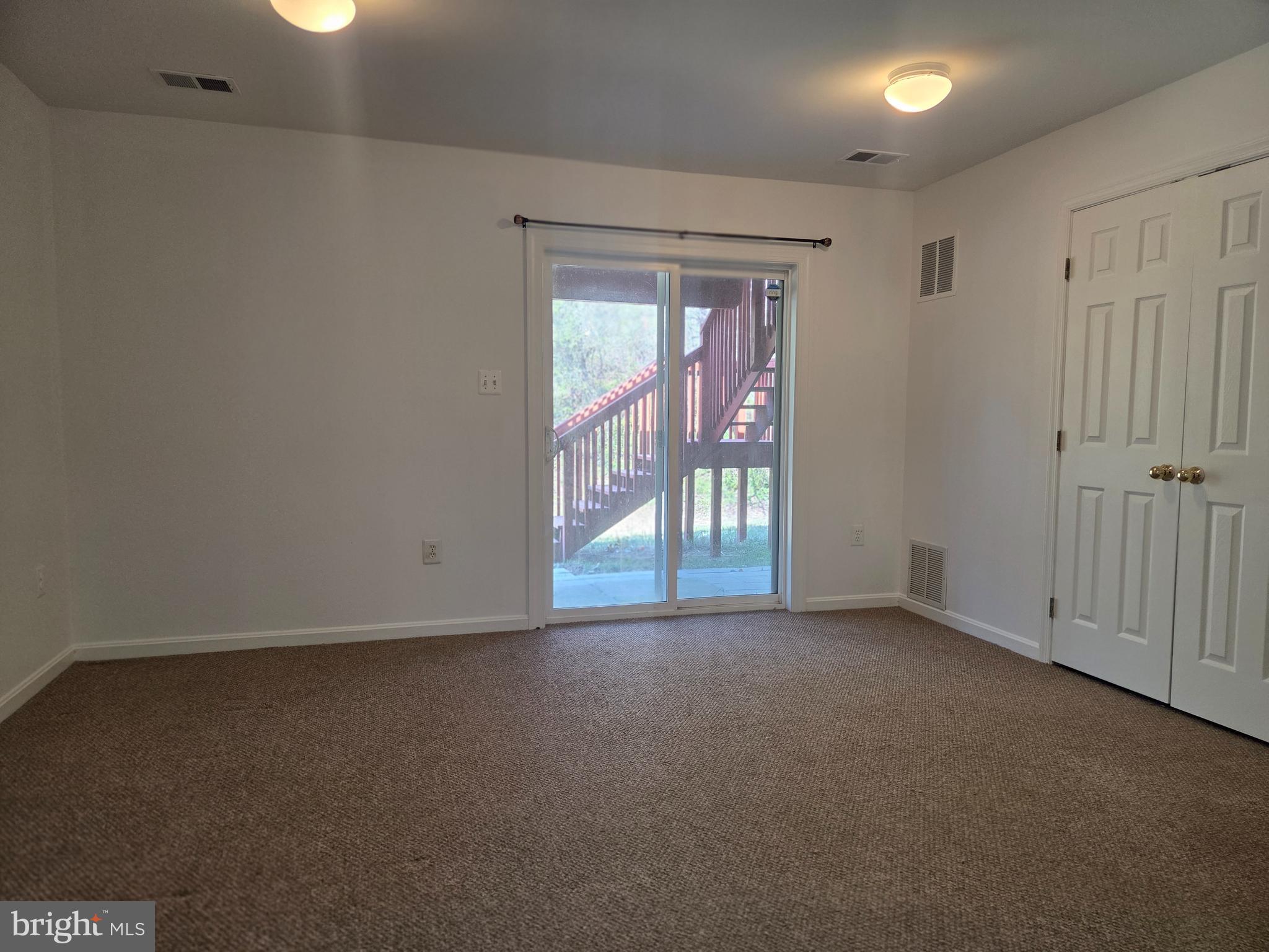 17381 Sligo Loop Dumfries, VA 22026 - Photo 24 of 35 an empty room with windows