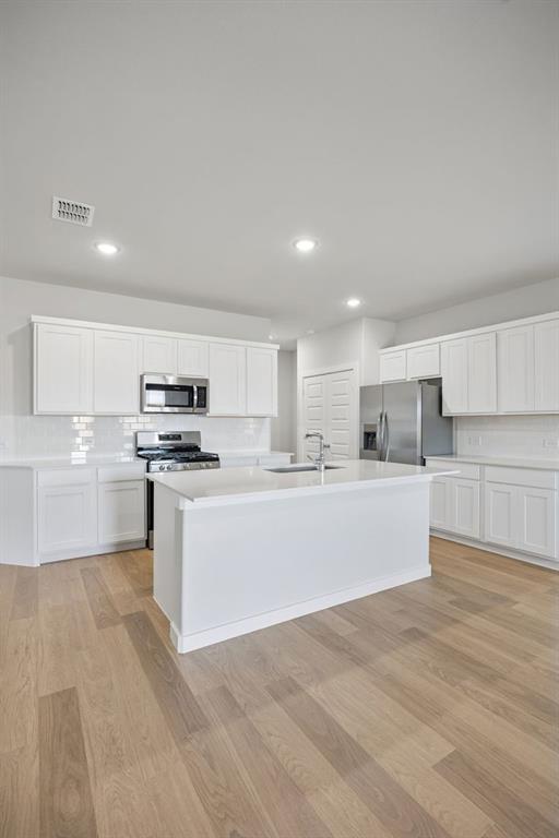 316 Millwood Road Lavon, TX 75166 - Photo 9 of 37 Kitchen in the Oak II home plan by Trophy Signature Homes – REPRESENTATIVE PHOTO