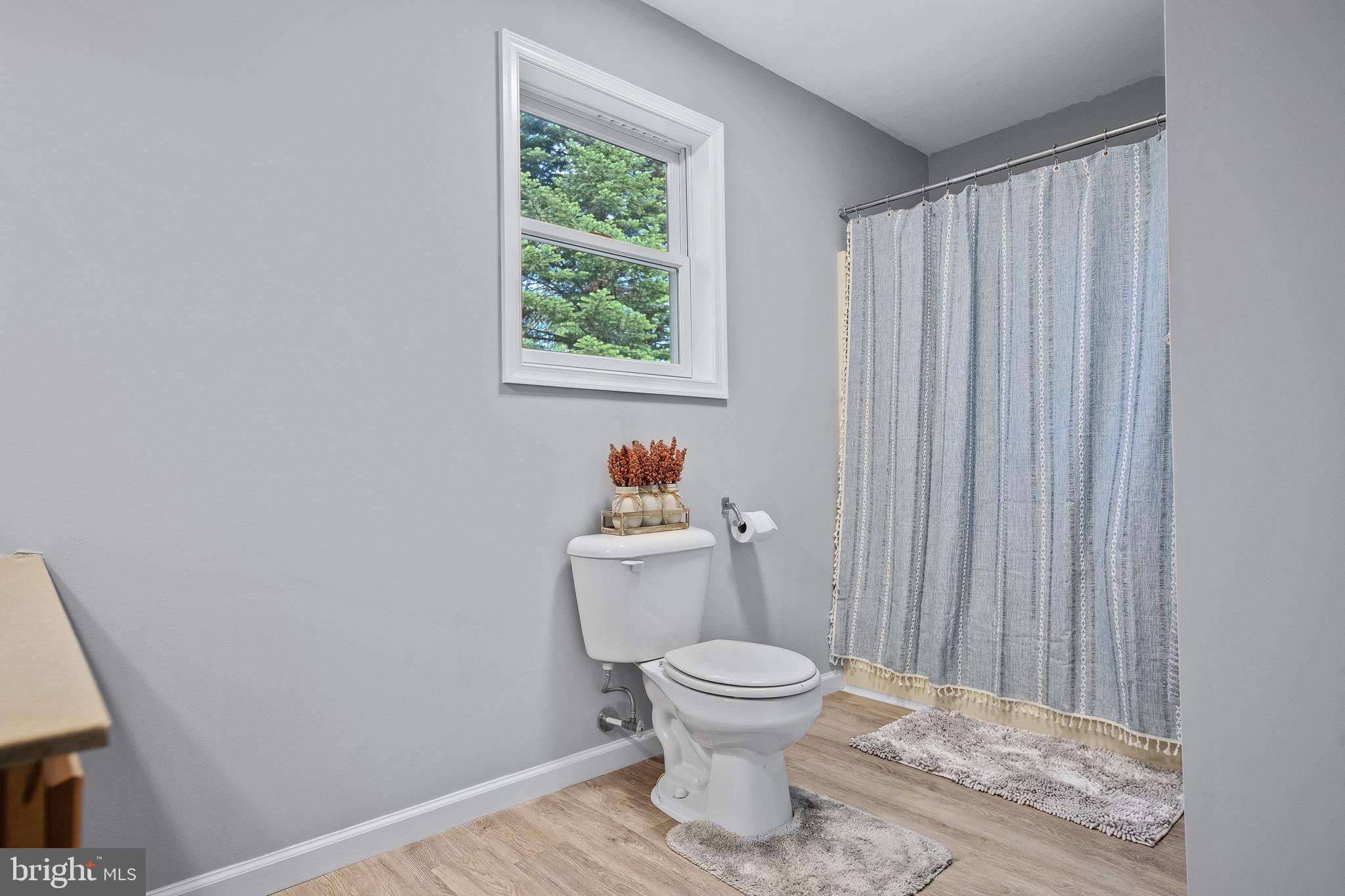 105 New Freedom Road Clementon, NJ 08021 - Photo 53 of 66 a white toilet sitting next to a small sink