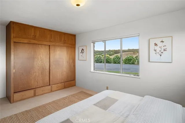 a bathroom with a sink a mirror and a shower