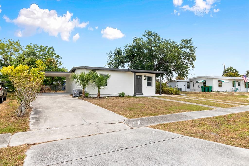 2304 Ednor Street Port Charlotte, FL 33952 - Photo 1 of 1 a view of a house with basketball court