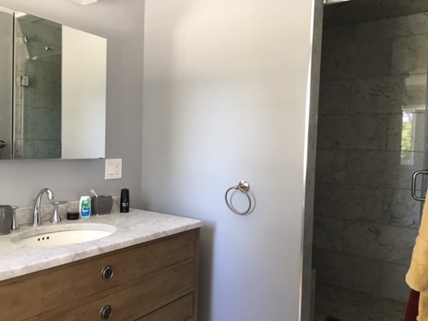 54 Winston Road Newton, MA 02459 - Photo 9 of 13 a bathroom with a sink and a mirror