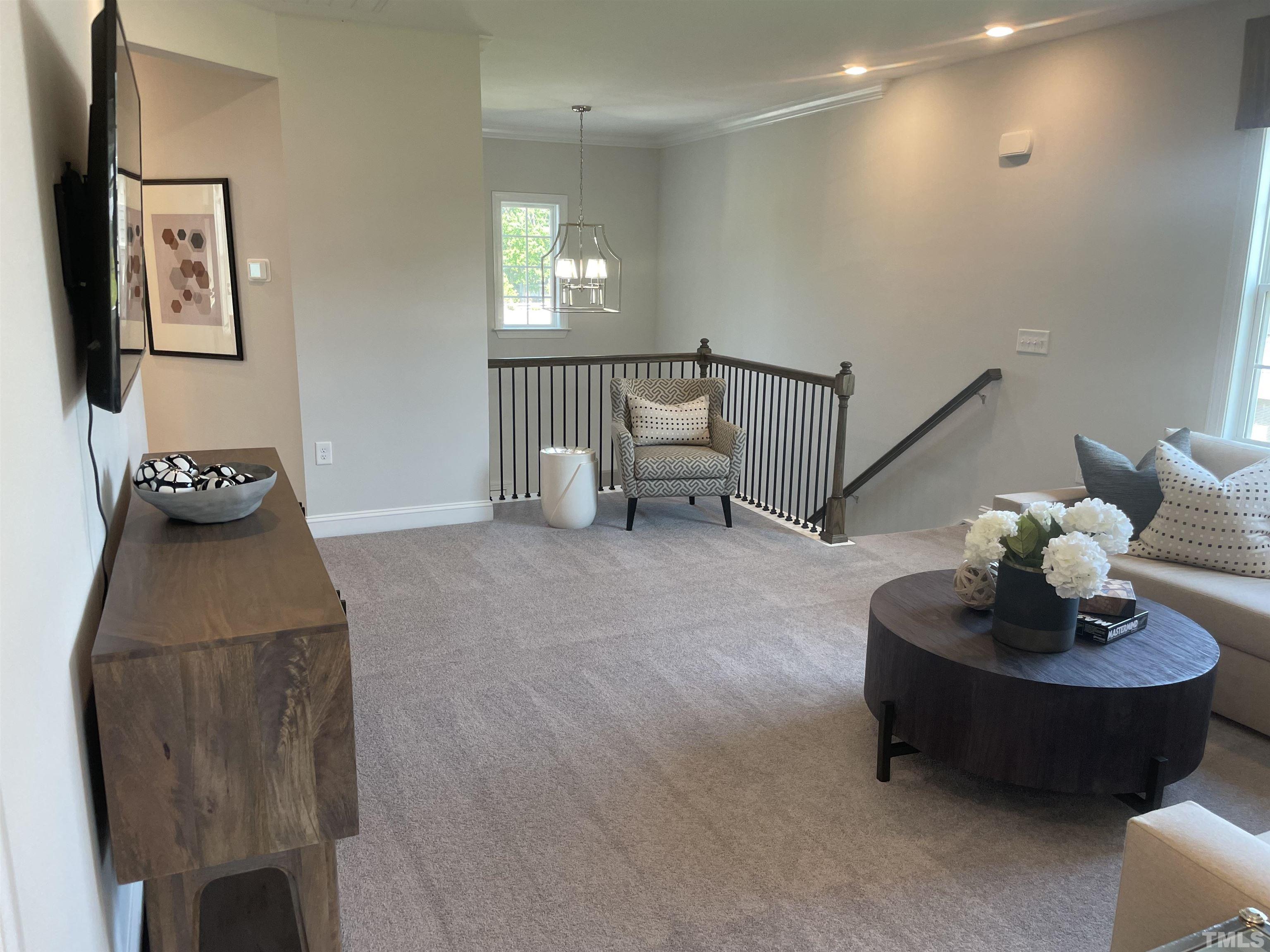 4937 Enlightenment Road, Unit 2116 Raleigh, NC 27616 - Photo 8 of 21 Photo is not actual home for sale. Photo is model home in another community and shows same layout and interior finishes as this listing.