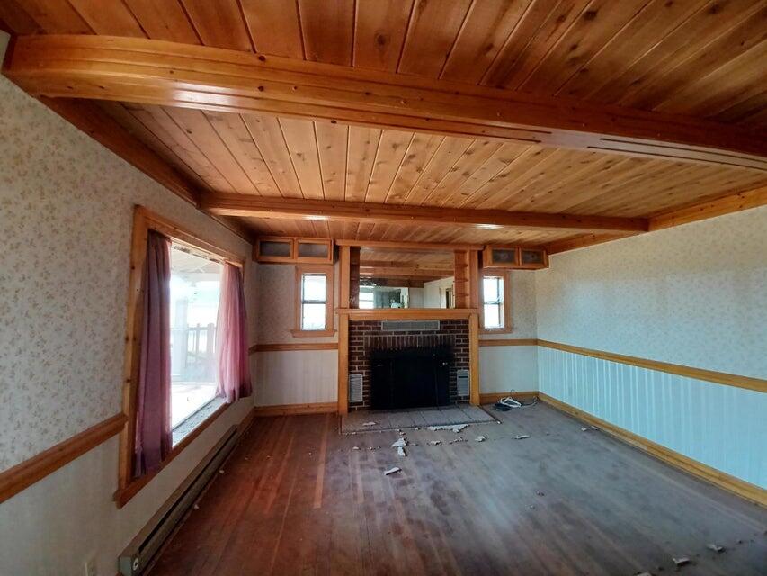 557-435 Center School House Road Bieber, CA 96009 - Photo 22 of 24 a view of an empty room with a fireplace
