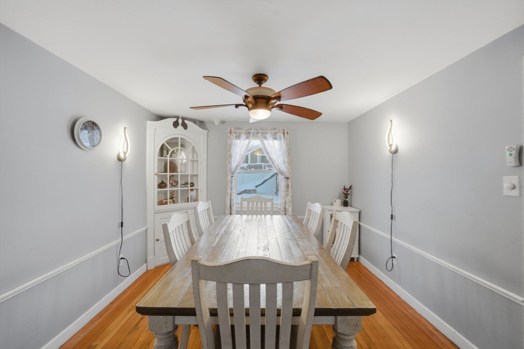 8 Flint Street Chelmsford, MA 01824 - Photo 4 of 20 a view of a dining room with furniture window and wooden floor