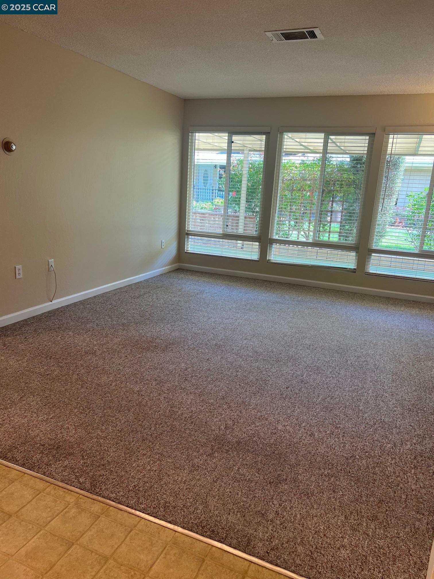 9048 Craydon Circle San Ramon, CA 94583 - Photo 5 of 8 an empty room with windows