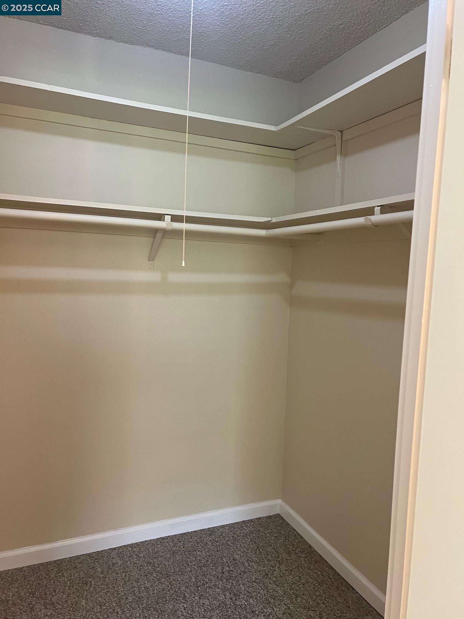 9048 Craydon Circle San Ramon, CA 94583 - Photo 7 of 8 a view of an empty walk in closet