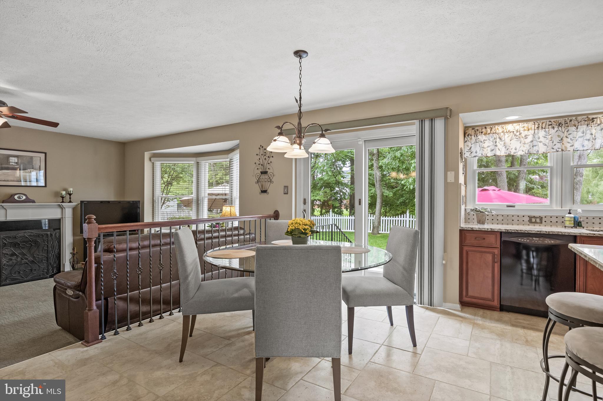 536 Justice Drive Marlton, NJ 08053 - Photo 16 of 44 a dining room with furniture window chandeliers