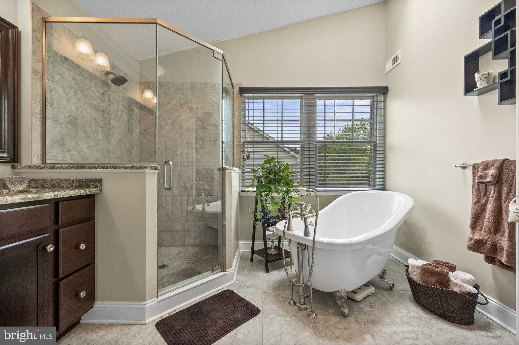536 Justice Drive Marlton, NJ 08053 - Photo 29 of 44 a living room with furniture a window and a chandelier