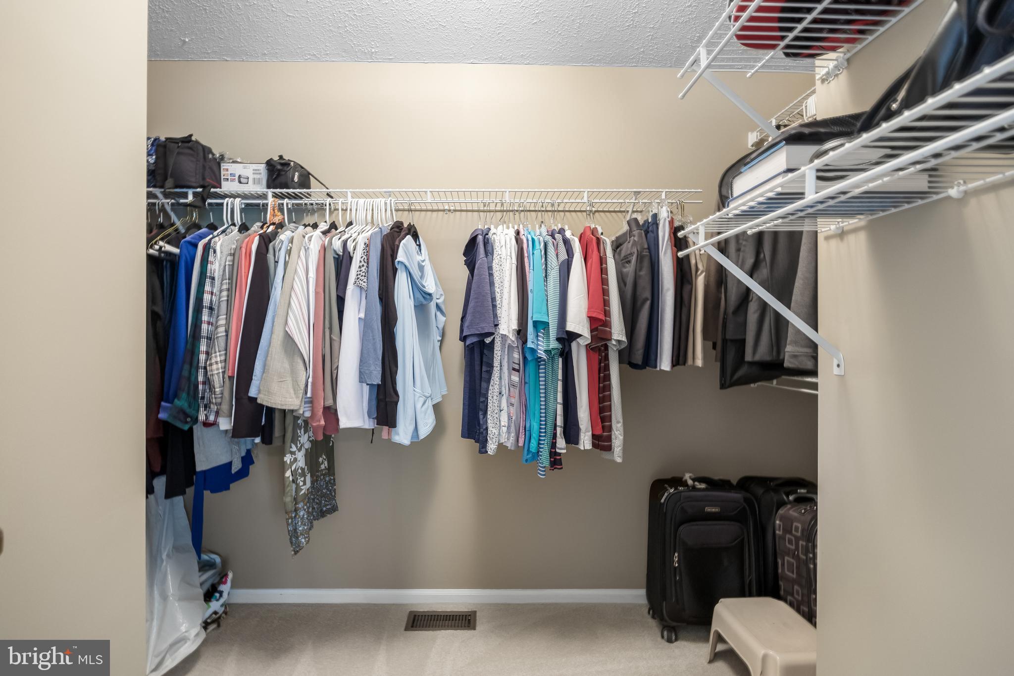 536 Justice Drive Marlton, NJ 08053 - Photo 31 of 44 a view of walk in closet with clothes and shoes