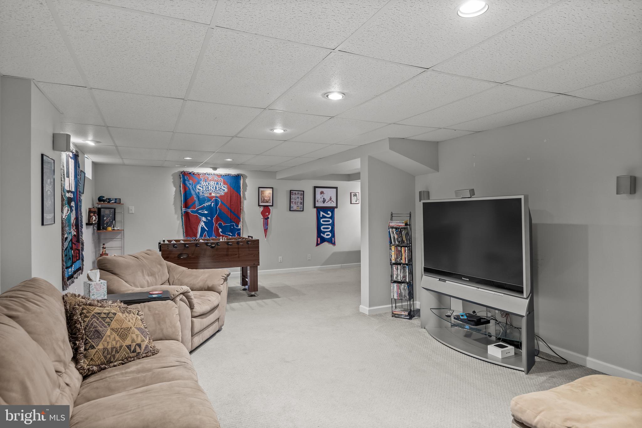 536 Justice Drive Marlton, NJ 08053 - Photo 39 of 44 a living room with furniture and a flat screen tv
