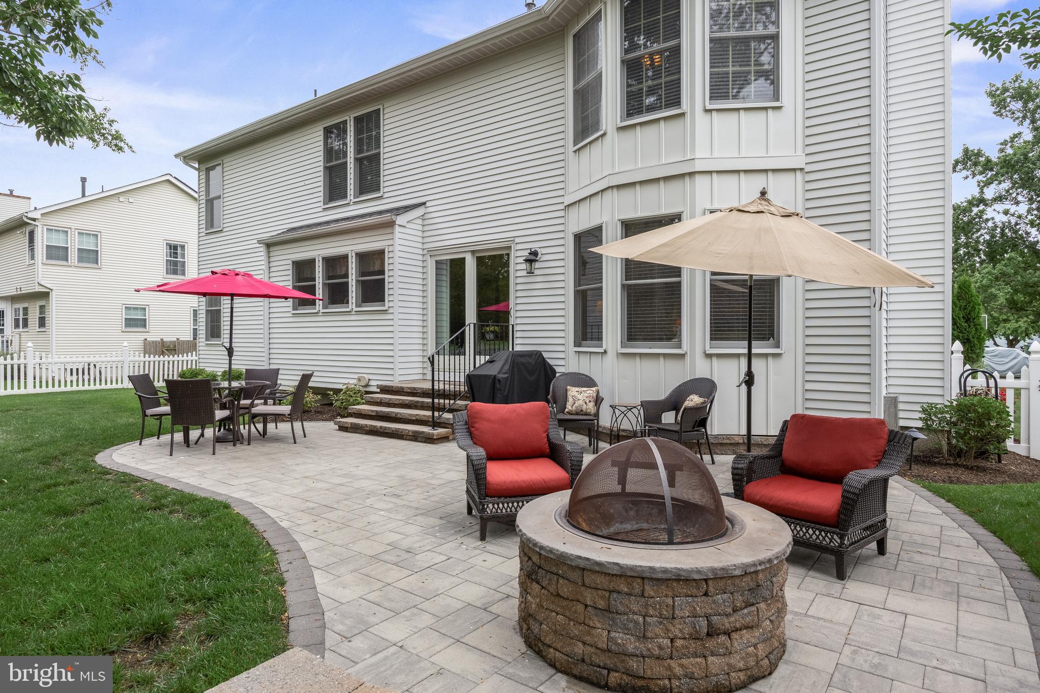 536 Justice Drive Marlton, NJ 08053 - Photo 42 of 44 a patio with couches table and chairs and potted plants