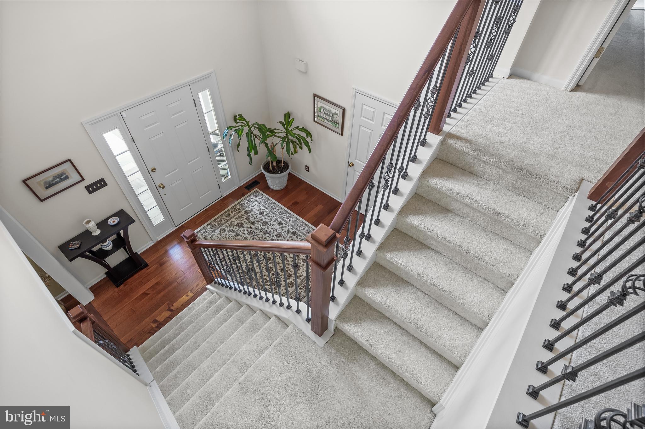 536 Justice Drive Marlton, NJ 08053 - Photo 6 of 44 a view of entryway livingroom and hall with wooden floor