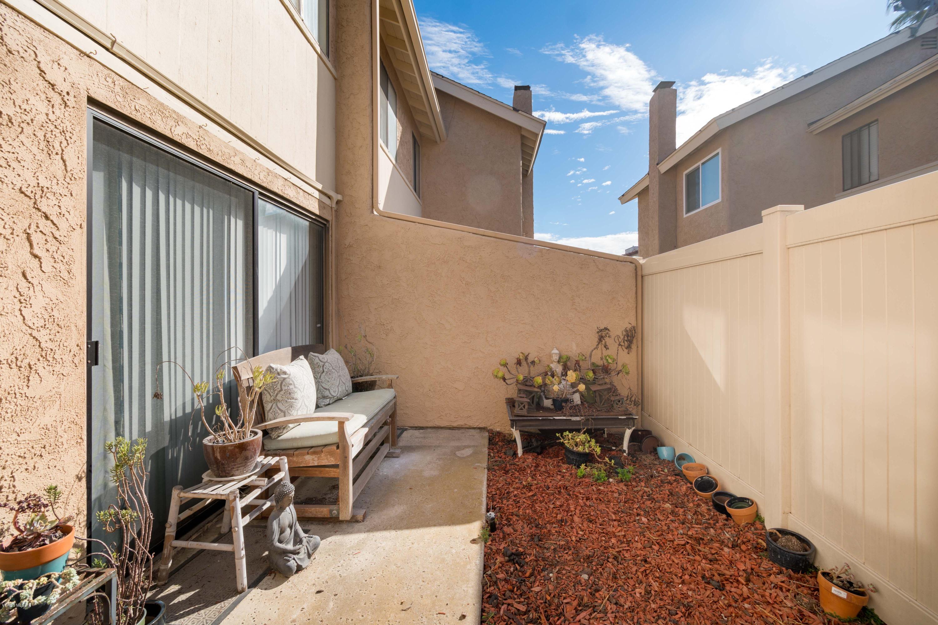 5117 West Wooley Road, Unit 3 Oxnard, CA 93035 - Photo 3 of 23 a view of a patio with furniture