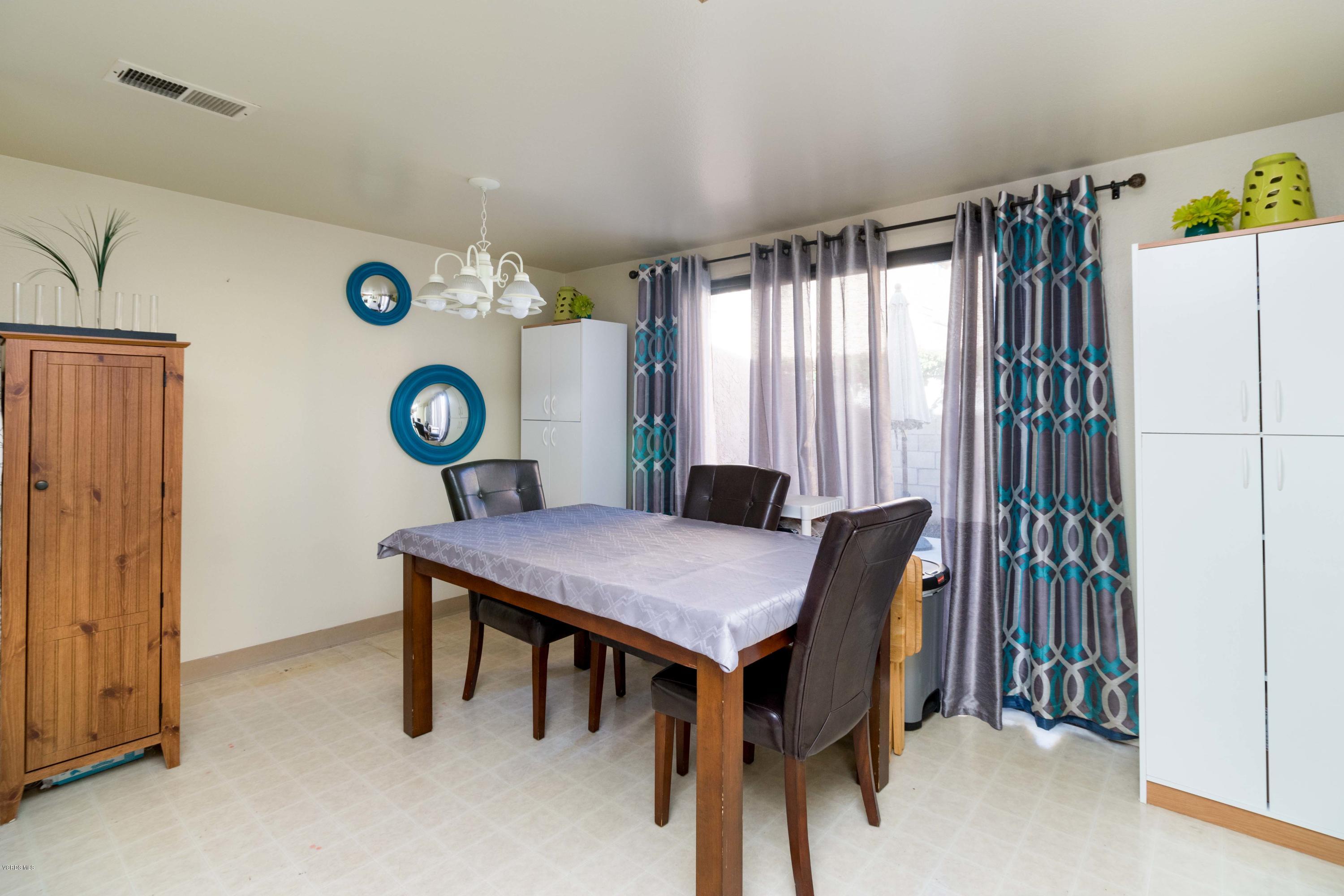 5117 West Wooley Road, Unit 3 Oxnard, CA 93035 - Photo 4 of 23 a view of a livingroom with furniture and window