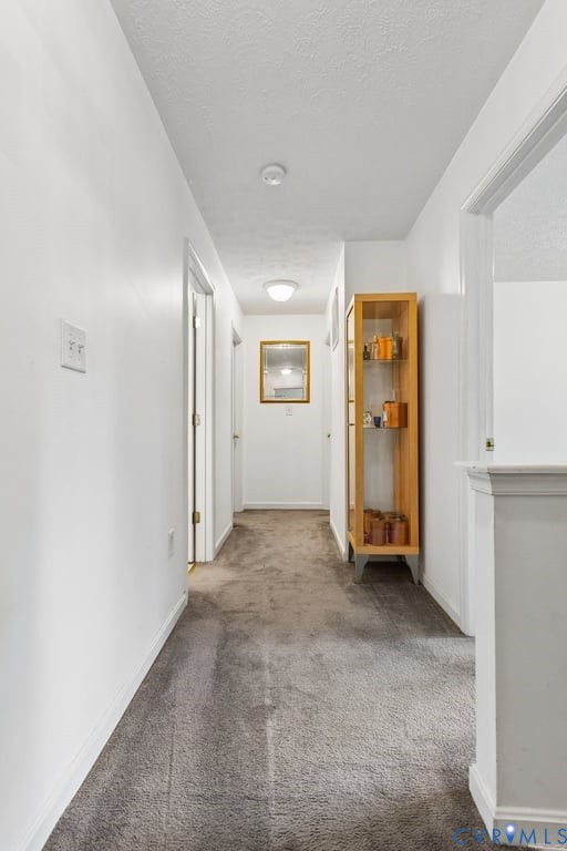 83 Albertson Court Ruther Glen, VA 22546 - Photo 20 of 25 Bright interior hallway featuring white walls and