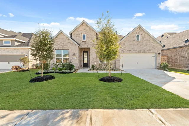a house view with a garden space