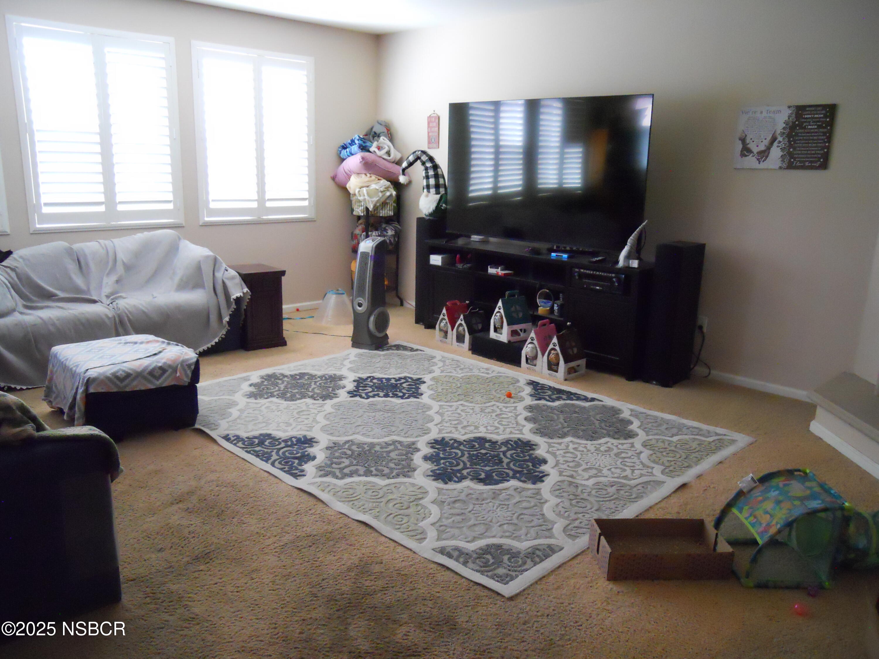 1000 Conception Drive Lompoc, CA 93436 - Photo 3 of 21 a living room with furniture flowerpot and a window