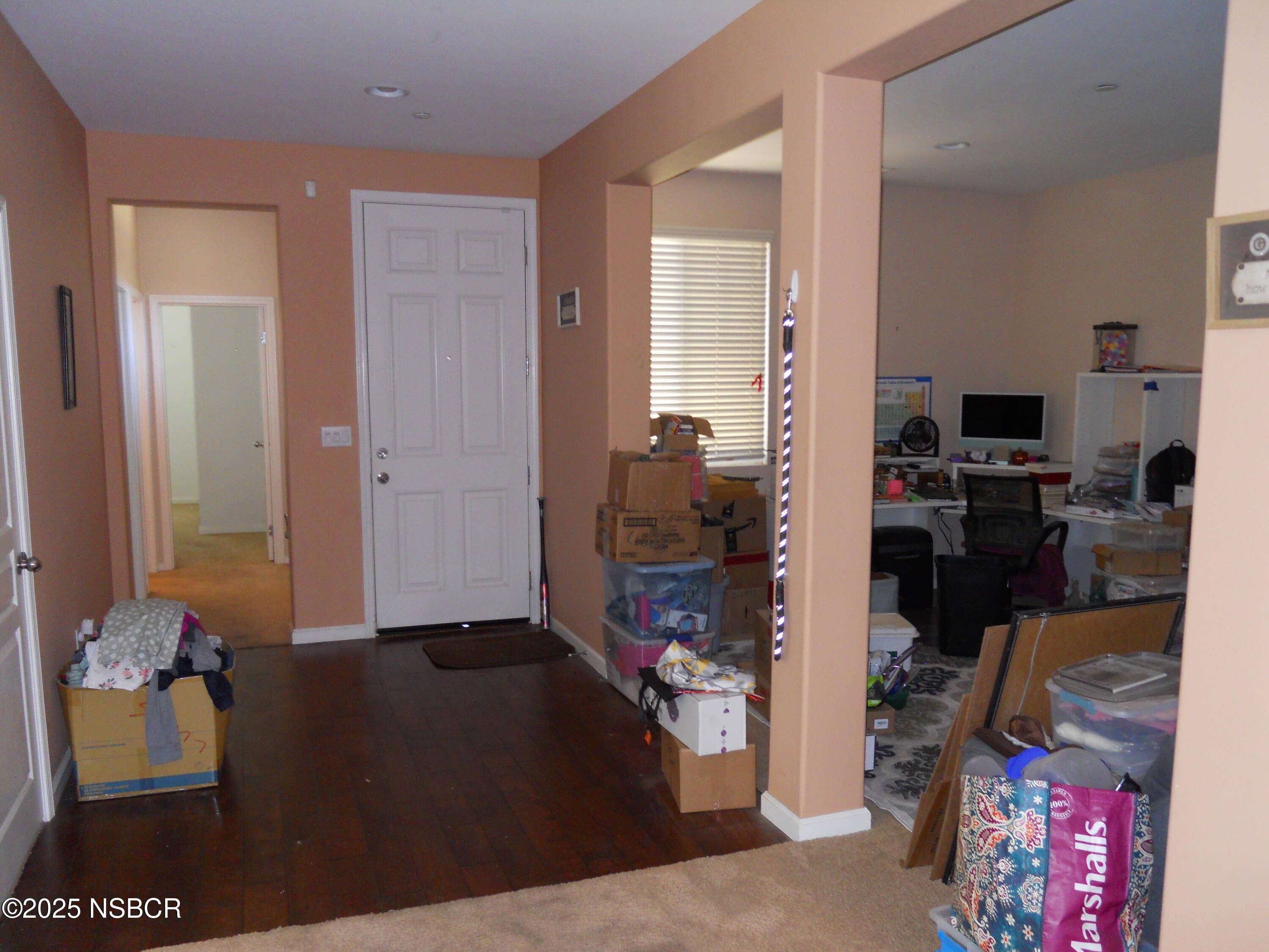 1000 Conception Drive Lompoc, CA 93436 - Photo 6 of 21 a view of a hallway with workspace and living room