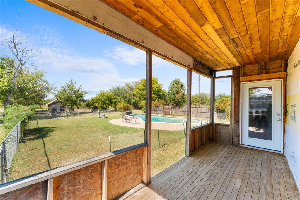 1724 Zagota Crossing Road Terrell, TX 75161 - Photo 15 of 22 Unfurnished sunroom with a deck