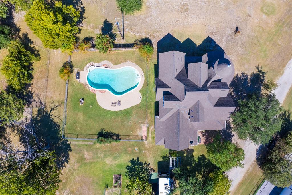 1724 Zagota Crossing Road Terrell, TX 75161 - Photo 3 of 22 Bird's eye view of a pool area