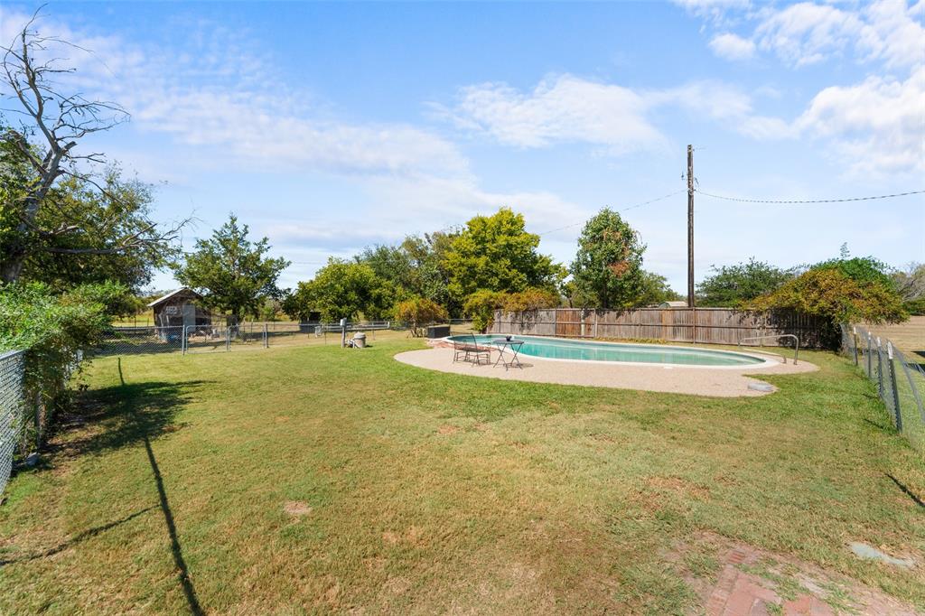 1724 Zagota Crossing Road Terrell, TX 75161 - Photo 6 of 22 Fenced backyard featuring a patio