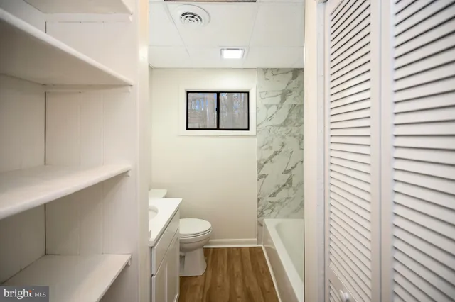 a bathroom with a sink and a toilet