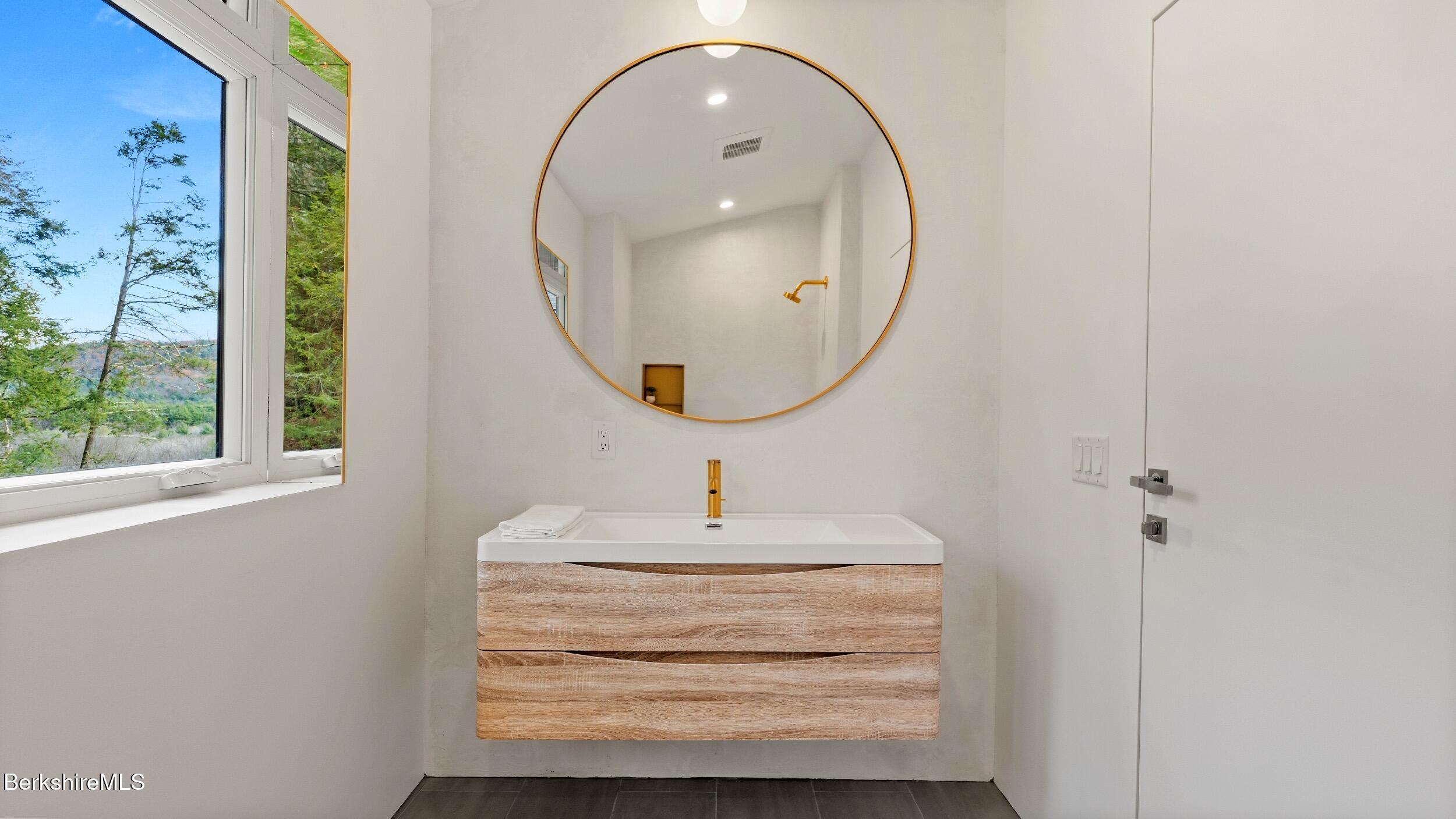 40 East Alford Road West Stockbridge, MA 01266 - Photo 40 of 51 a bathroom with a sink and a mirror