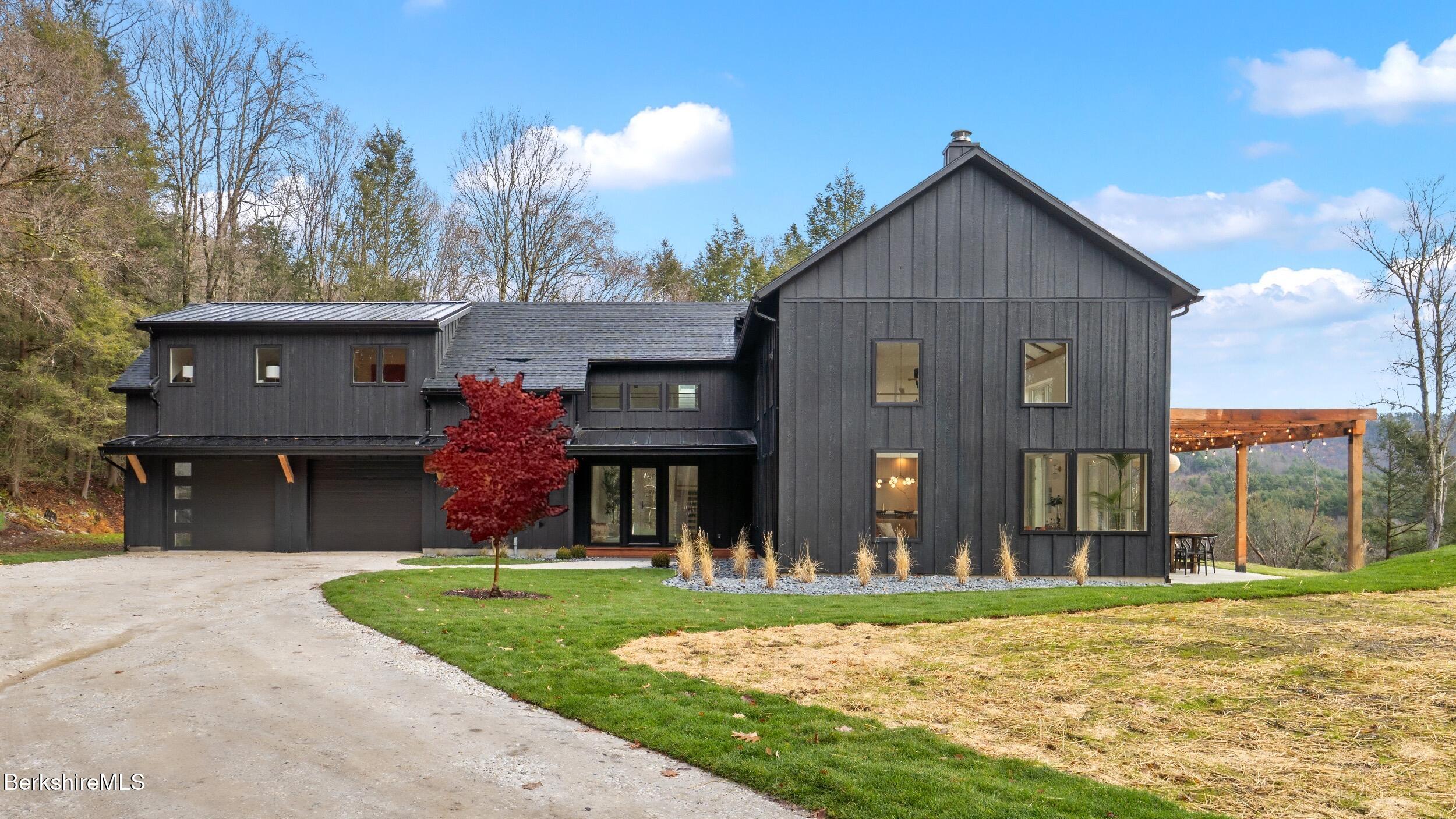40 East Alford Road West Stockbridge, MA 01266 - Photo 5 of 51 a front view of a house with a yard