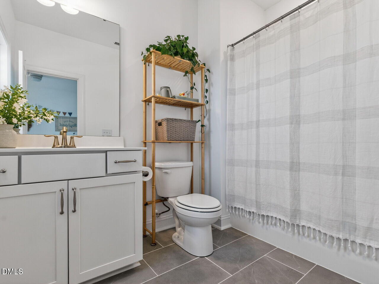 309 Toadstool Trail Wake Forest, NC 27587 - Photo 34 of 49 a bathroom with a toilet and a shower
