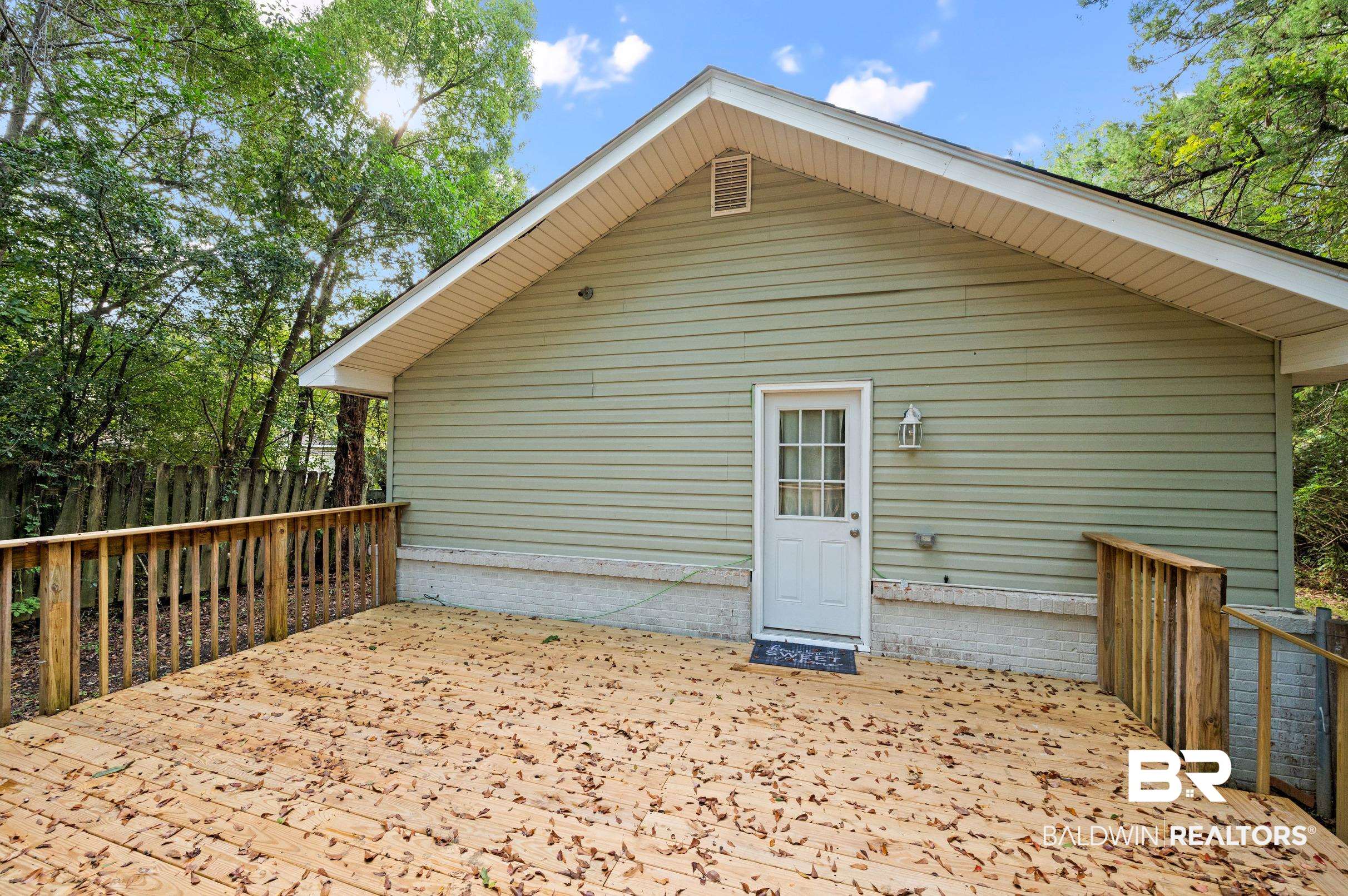906 North Cedar Street Foley, AL 36535 - Photo 24 of 24 Back of house with a patio area