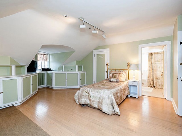 7600 Augusta Street River Forest, IL 60305 - Photo 14 of 25 a bedroom with a bed and large cabinets