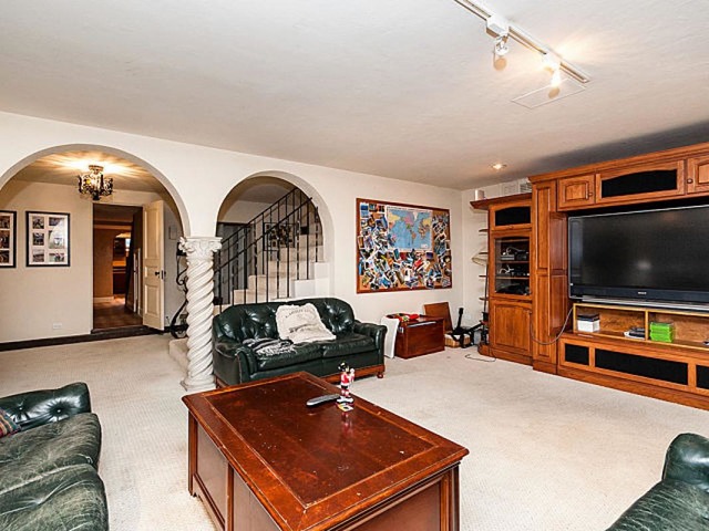 7600 Augusta Street River Forest, IL 60305 - Photo 19 of 25 a living room with furniture and a flat screen tv