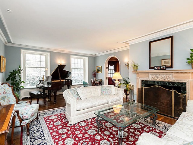 7600 Augusta Street River Forest, IL 60305 - Photo 3 of 25 a living room with furniture and a fireplace