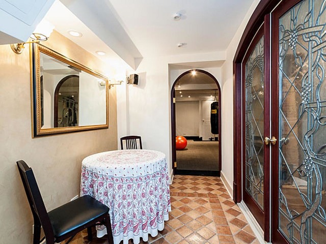 7600 Augusta Street River Forest, IL 60305 - Photo 22 of 25 a living room with a couch and a chandelier